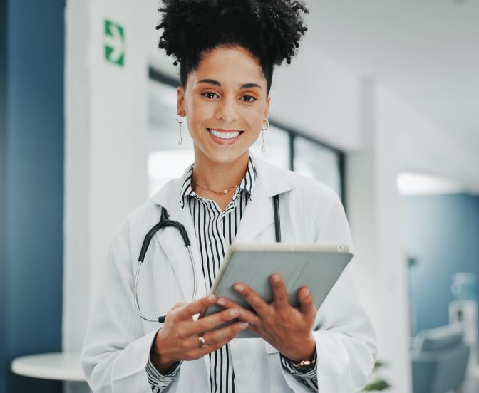 Doctor with tablet